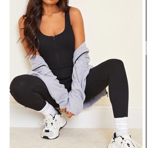Black half zip front jumpsuit